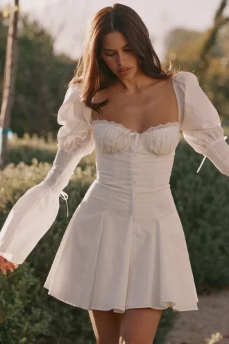 Mini-robe Ellerie en coton blanc à manches flûte