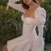 Mini-robe Ellerie en coton blanc à manches flûte