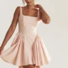 Mini-robe Florianne à nœuds couleur pêche pâle