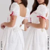Mini-robe Jana blanche à manches bouffantes en broderie anglaise
