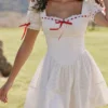 Mini-robe Jana blanche à manches bouffantes en broderie anglaise