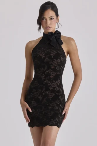 Mini-robe Natalya en dentelle noire à col haut avec nœud amovible