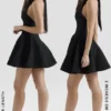 Mini-robe noire à nœuds et dos nu « Loulette »