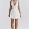 Mini-robe Sarita en coton blanc à broderie anglaise et décolleté plongeant