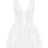 Mini-robe Sarita en coton blanc à broderie anglaise et décolleté plongeant