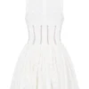 Mini-robe Sarita en coton blanc à broderie anglaise et décolleté plongeant